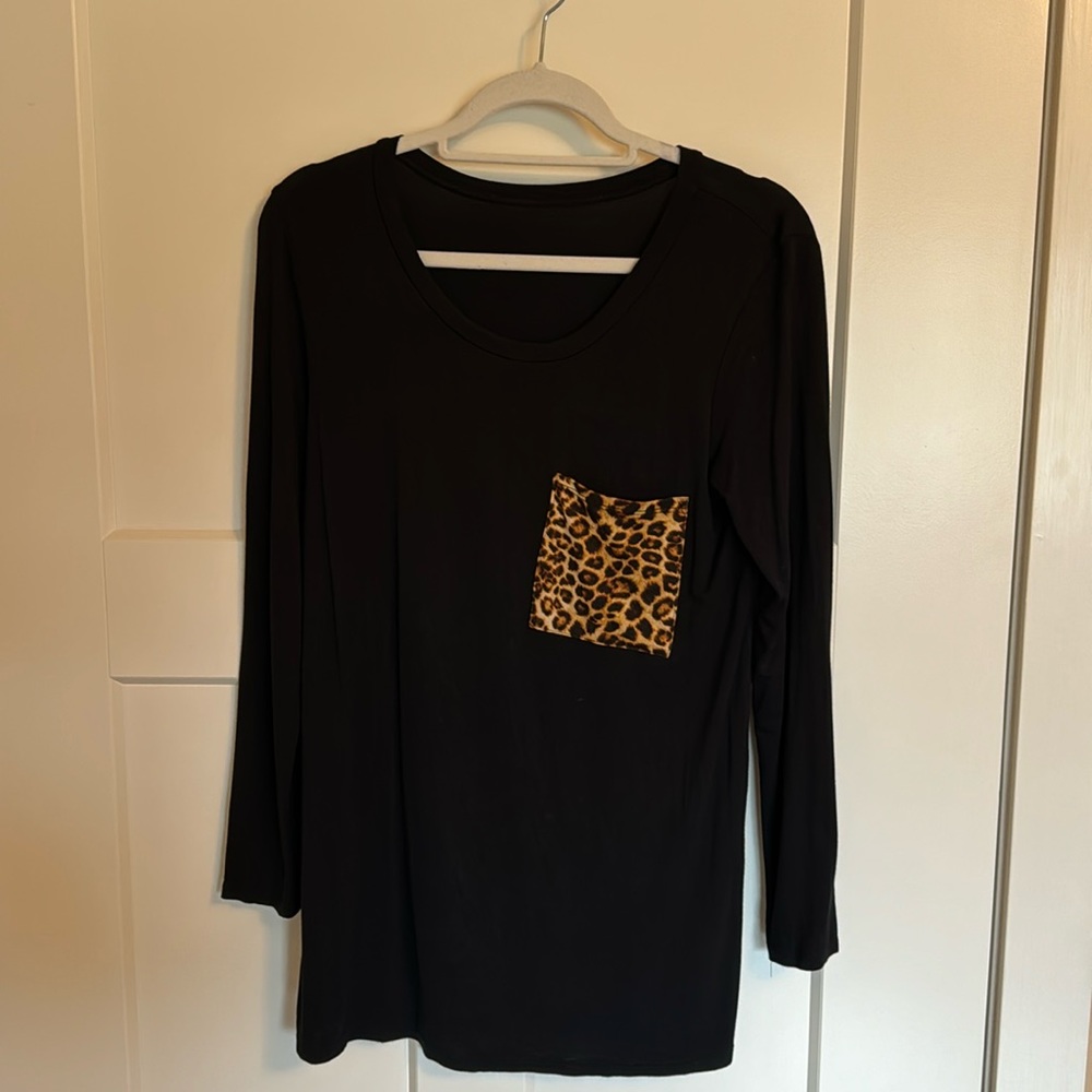 Black tunic top with leopard print patch pocket